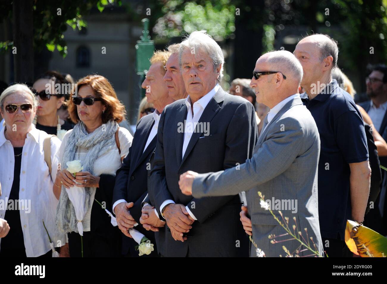 Robert Namias, Alain Delon, Francois Bayrou attending the funeral of French actress Valerie Lang at the Montparnasse cemetery in Paris, France on July 25, 2013. Valerie Lang, the daughter of French former Culture minister Jack Lang, died on July 22 aged 47 following a long illness. Photo by Alban Wyters/ABACAPRESS.COM Stock Photo