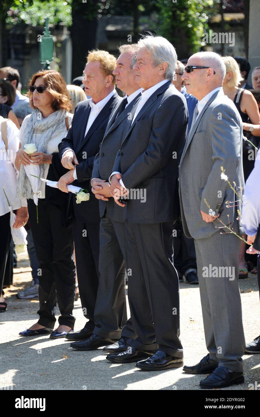 Robert Namias, Alain Delon, Francois Bayrou attending the funeral of French actress Valerie Lang at the Montparnasse cemetery in Paris, France on July 25, 2013. Valerie Lang, the daughter of French former Culture minister Jack Lang, died on July 22 aged 47 following a long illness. Photo by Alban Wyters/ABACAPRESS.COM Stock Photo