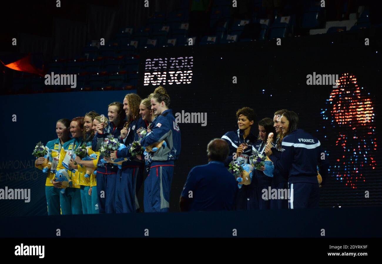 (Top L-R) Gold medalists US swimmers Katie Ledecky, Shannon Vreeland, Karlee Bispo and Missy Franklin, (bottom L-R) Silver medalists Australia's Alicia Coutts, Brittany Elmslie, Kylie Palmer and Bronte Barratt and (bottom R-L) bronze medalists France's Camille Muffat, Mylene Lazare, Charlotte Bonnet and Coralie Balmy pose on the podium during the award ceremony of the women's 4x200-metre freestyle relay during the 15th FINA Swimming World Championships at Montjuic Municipal Pool in Barcelona, Spain on August 1, 2013. Photo by Christian Liewig/ABACAPRESS.COM Stock Photo