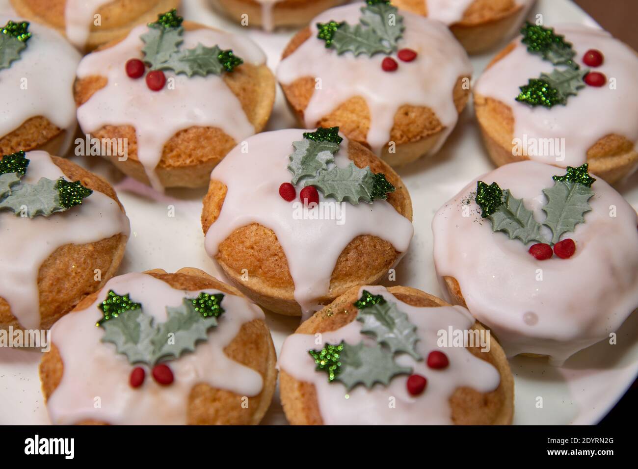 A plate of delicious Christmas mince pies covered in icing and edible ...