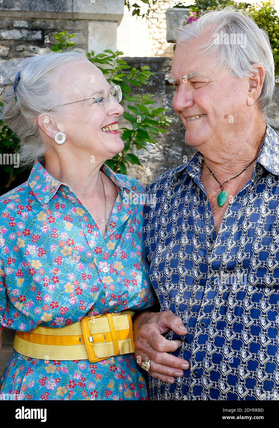 NO WEB/NO APPS/NO TABLOIDS - SPECIAL FEE REQUIRED - Exclusive. Queen Margrethe II and Prince Consort Henrik of Denmark spend their annual summer vacation at Chateau de Caix, near Cahors, southwestern France on August 14, 2013. The 25-hectare family estate produces about 160,000 bottles of 'Cahors' red, white and rose wine. Prince Henrik prefers red wine (because the grapes are hand-picked), which represents 70% of the castle's production. Best-selling around the world are the 2002 to 2005 vintages called 'La Cuvee du Prince du Danemark, Chateau de Caix, Cahors'. 10% of the Prince's wine are so Stock Photo