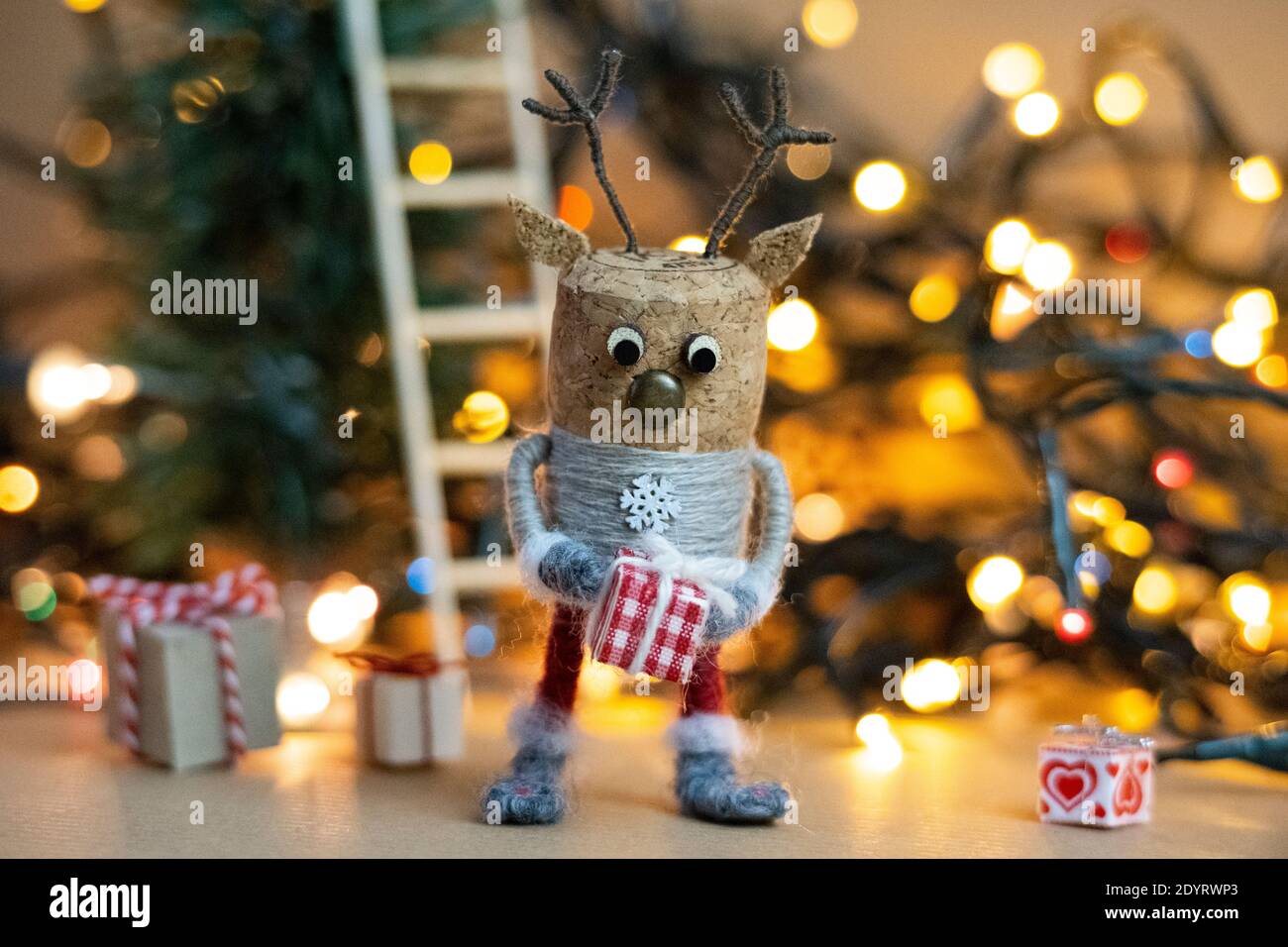 Creative winter scene concept, creative christmas concept, Cork deer figure celebrating Boxing Day, Christmas scene, Scandinavian patterns, Christmas Stock Photo