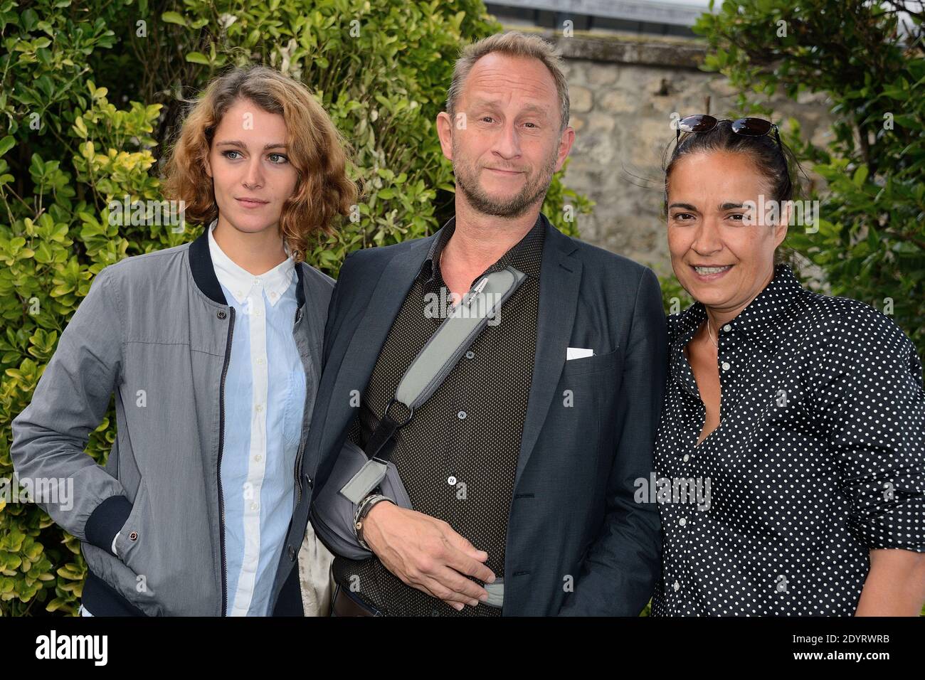 Ariane Labed, Benoit Poelvoorde and Fabienne Godet pose for the