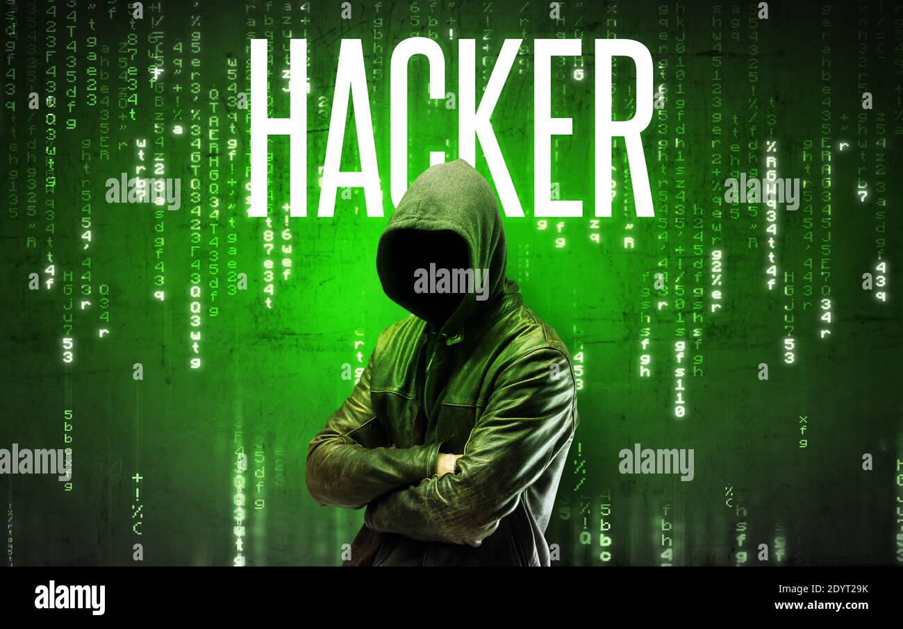 Faceless hacker with HACKER inscription, hacking concept Stock Photo