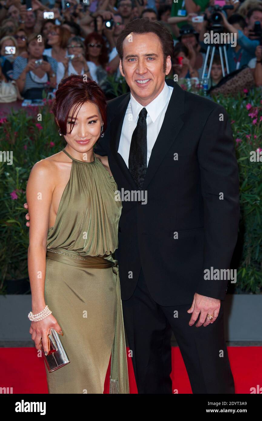 Nicolas Cage and wife Alice Kim Cage attending the premiere for the film Joe as part of the 70th Venice International Film Festival held at Sala Grande in Venice, Italy on August 30, 2013. Photo by Nicolas Genin/ABACAPRESS.COM Stock Photo