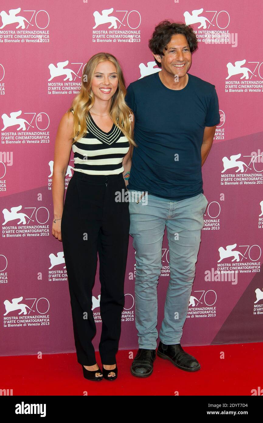 Scarlett Johansson And Director Jonathan Glazer Attend The Photocall For The Film Under The Skin As Part Of The 70th Venice International Film Festival At The Palazzo Del Casino In Venice Italy