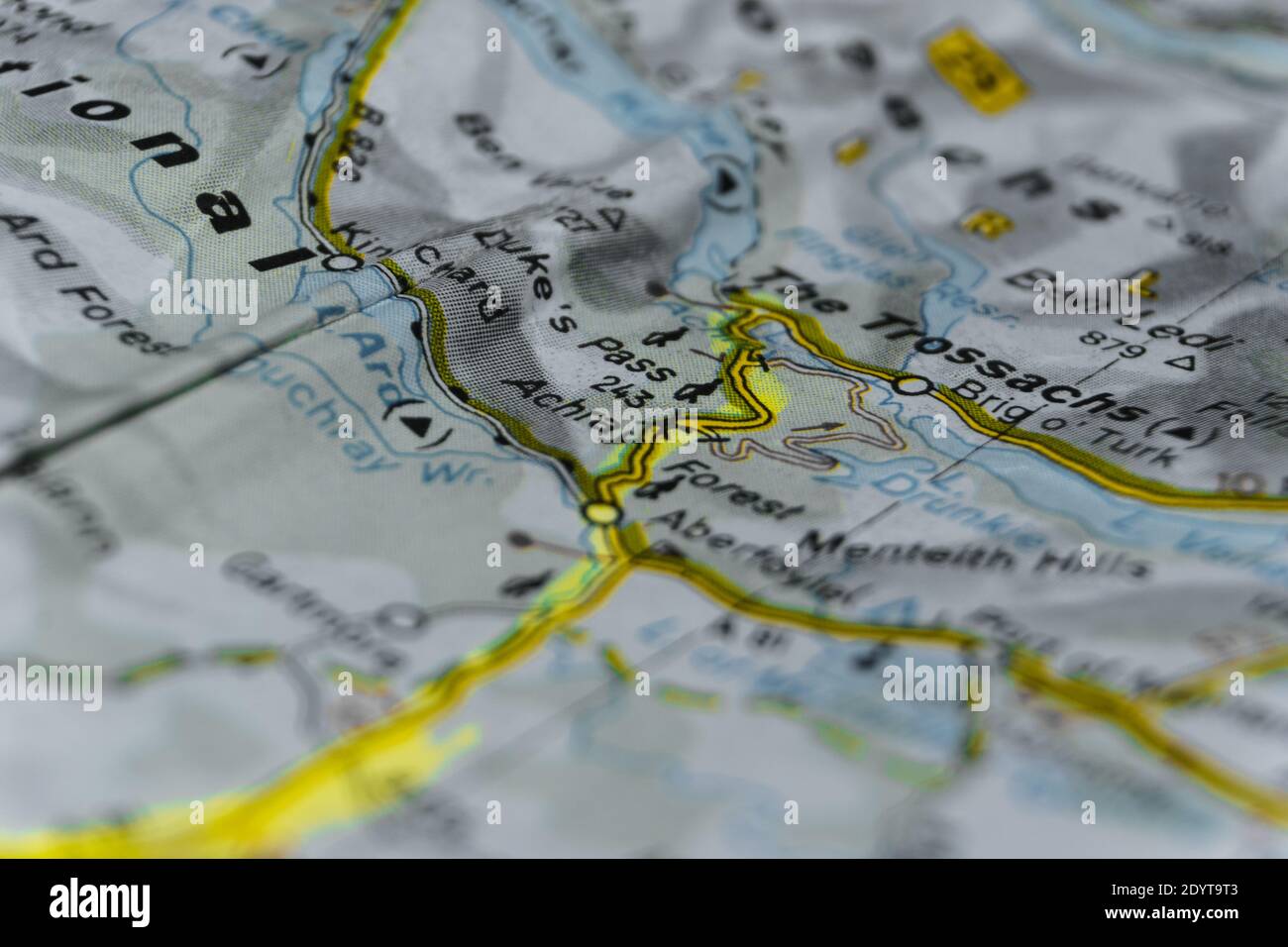 Detail of a road map of scotland marked with text marker area The Trossachs Stock Photo
