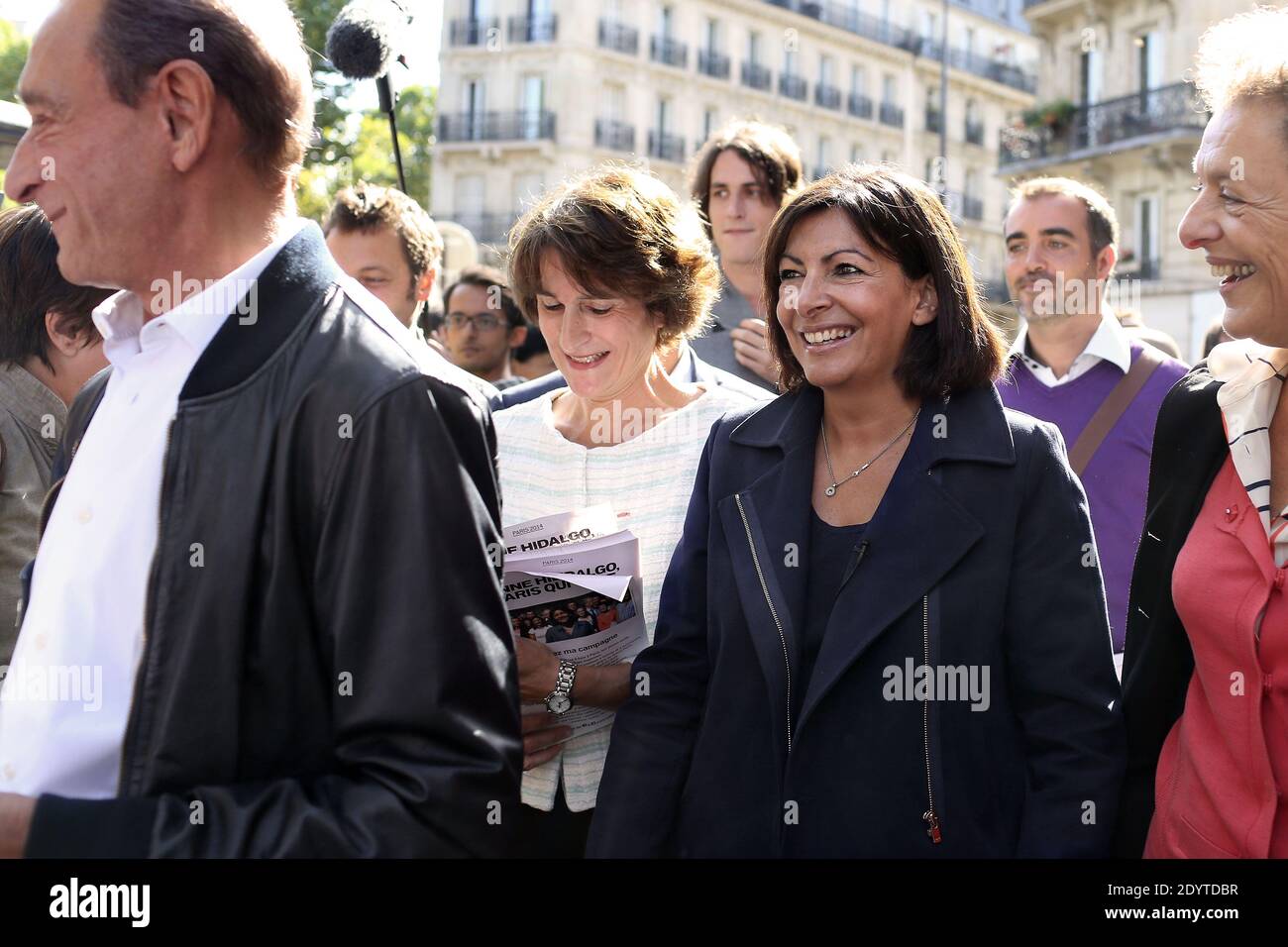French Mayor of Paris, Bertrand Delanoe, Socialist candidate for the municipal election in Paris, Anne Hidalgo, Paris 5th district socialist candidate Marie-Christine Lemardeley and Paris socialist representative Lyne Cohen-Solal visit a market during her 2014 campaign in the 5th district of Paris, France, on september 07 2013. Photo by Stephane Lemouton/ABACAPRESS.COM Stock Photo