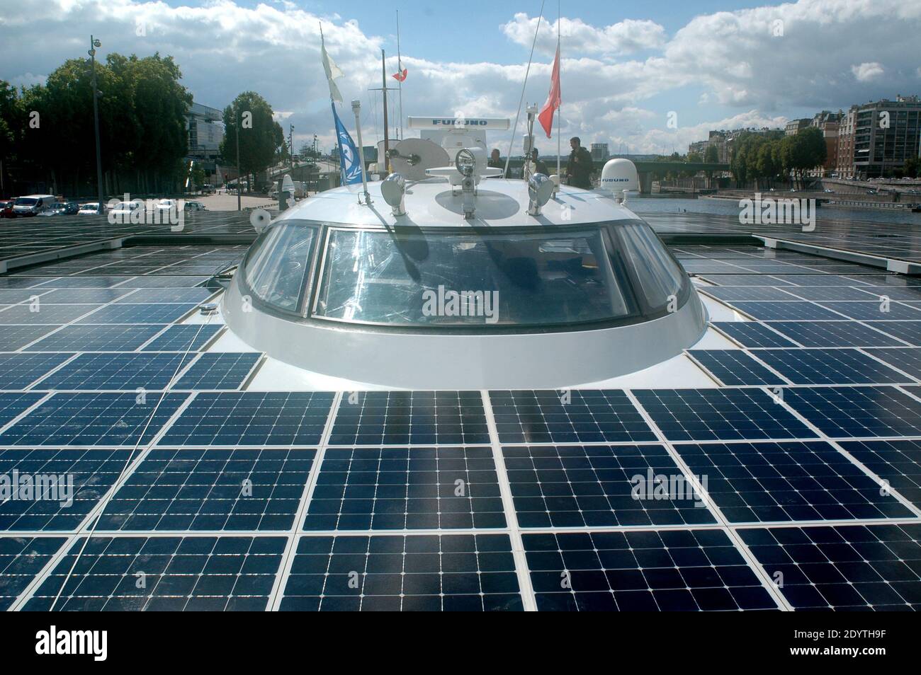 The world's largest solar-powered boat, in Paris, France by the Seine river on September 10, 2013. The catamaran powered exclusively by solar energy, completed the first solar-powered trip around the world on May 4, 2012 after travelling over 60,000 km (37,282 miles) in 584 days. Socialist candidate for the municipal election in Paris, Anne Hidalgo was on board. Photo by Alain Apaydin/ABACAPRESS.COM Stock Photo