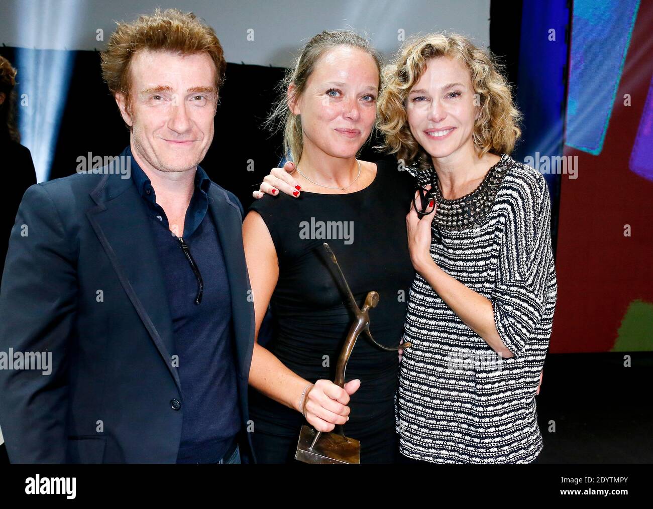 Best Actress or C’Est Pas De L’Amour Marie Guillard fla,ked by Thierry Fremont and Pascale Arbillot attending the 15th Festival of TV Fiction closing ceremony in La Rochelle, western France on September 15, 2013. Photo by Patrick Bernard/ABACAPRESS.COM Stock Photo