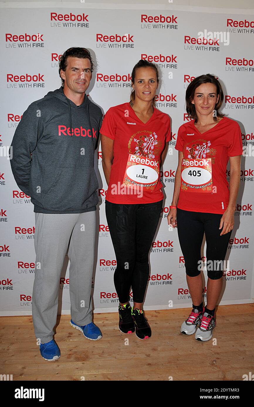 Laure Manaudou, Jean Galfione and Salome Stevenin during 'La Parisienne'  marathon in Paris, France on September 15, 2013. Photo by Thierry  Plessis/ABACAPRESS.COM Stock Photo - Alamy