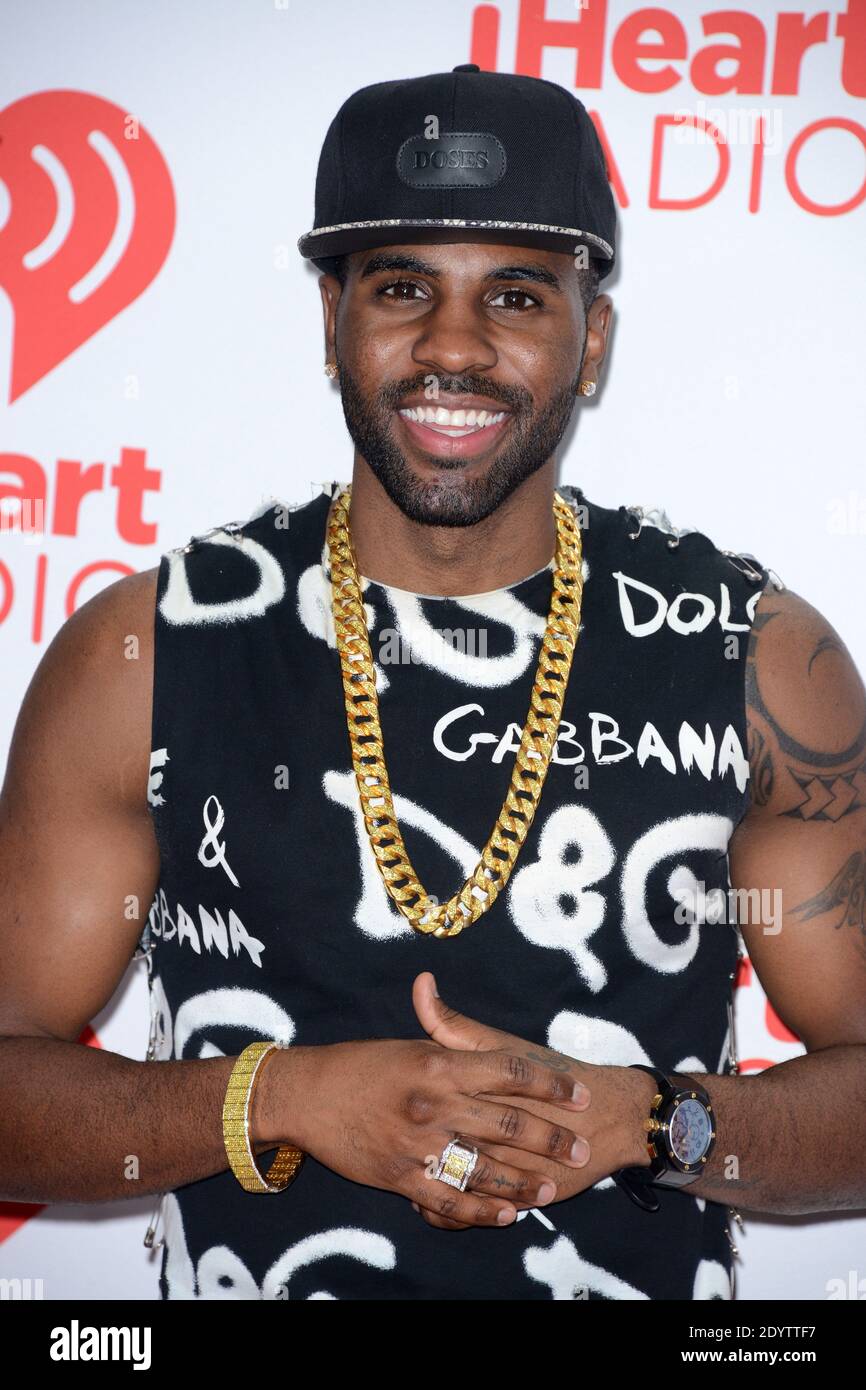 Jason Derulo poses in the press room of the 2013 iHeartRadio Music