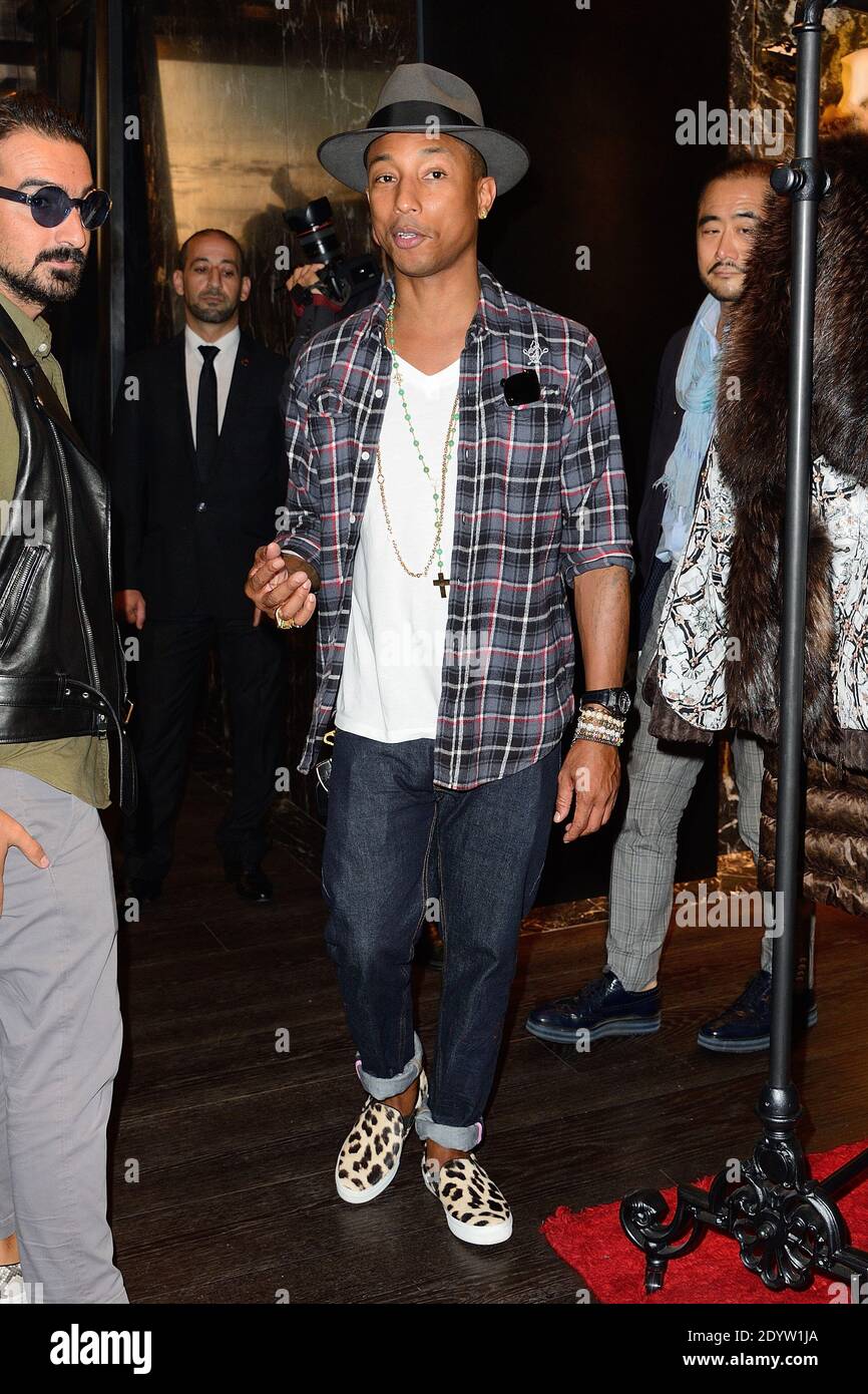Pharrell Williams attending the Moncler store opening party in Paris, France on September 26, 2013. Photo by Nicolas Stock Photo - Alamy