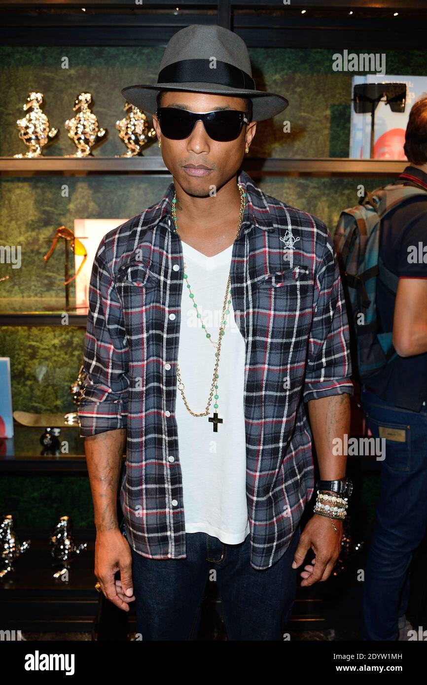 Pharrell Williams attending the Moncler store opening party in Paris,  France on September 26, 2013. Photo by Nicolas Briquet/ABACAPRESS.COM Stock  Photo - Alamy