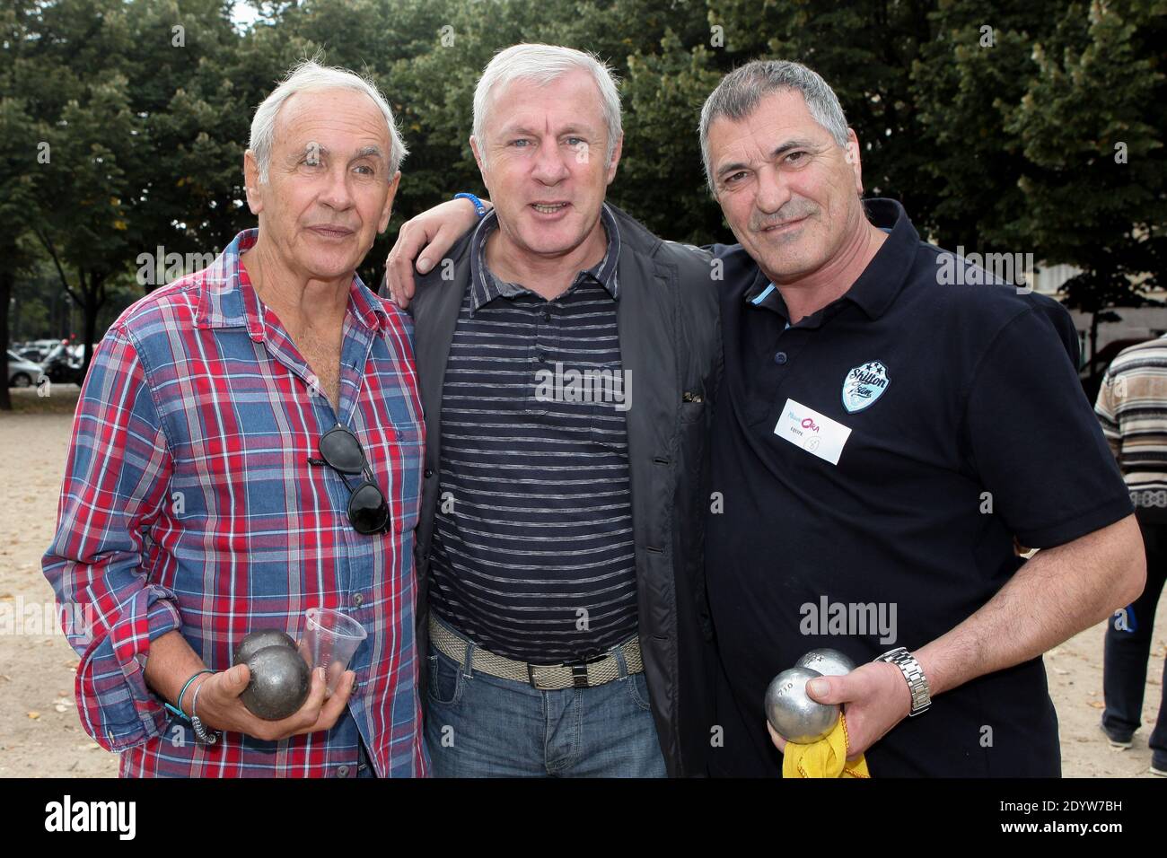 Patrice Laffont, Luis Fernandez and Jean-Marie Bigard attending The Petanque  Tournament to benefit the association 'Meghanora' held at Place des  Invalides in Paris, France, on September 29, 2013. Photo by Audrey  Poree/ABACAPRESS.COM