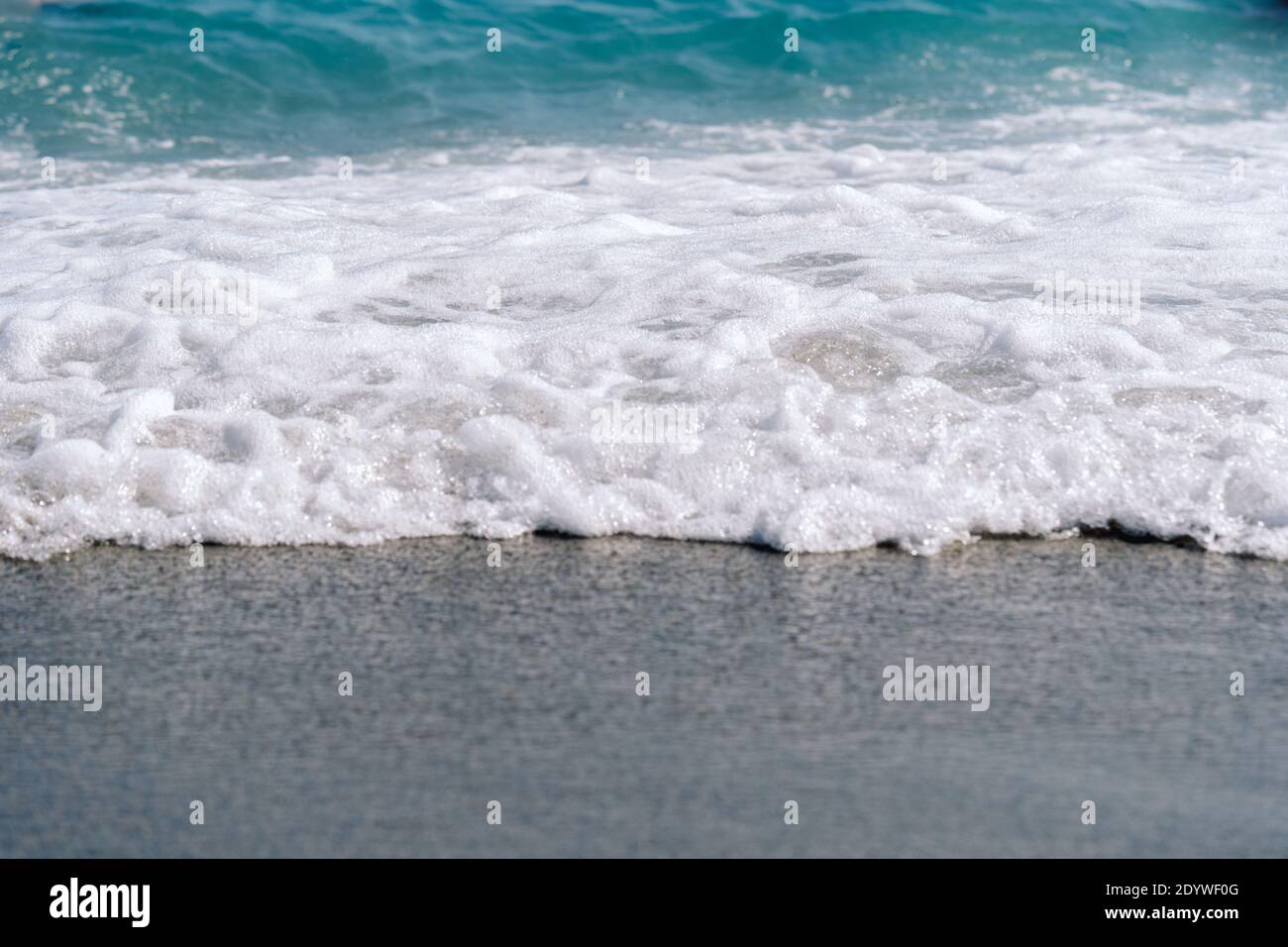 Beautiful foamy waves on beach hi-res stock photography and images - Alamy