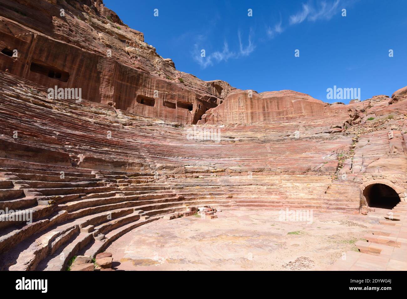 Petra Theater carved out in rock at Petra, Jordan. Old amphitheater in hellenistic style. Nabatean built amphitheatre. Stock Photo