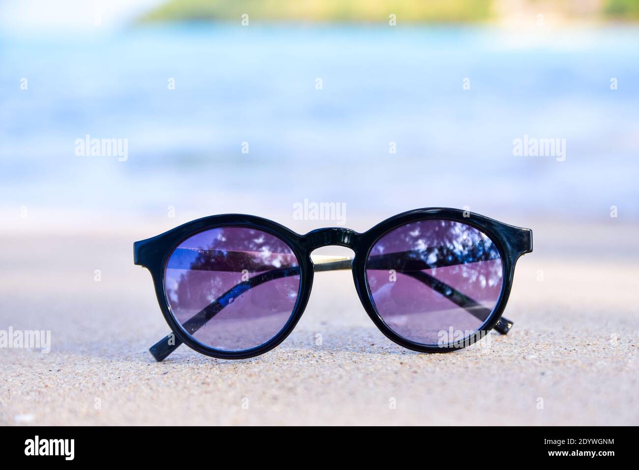 Sunglass is on beach Stock Photo