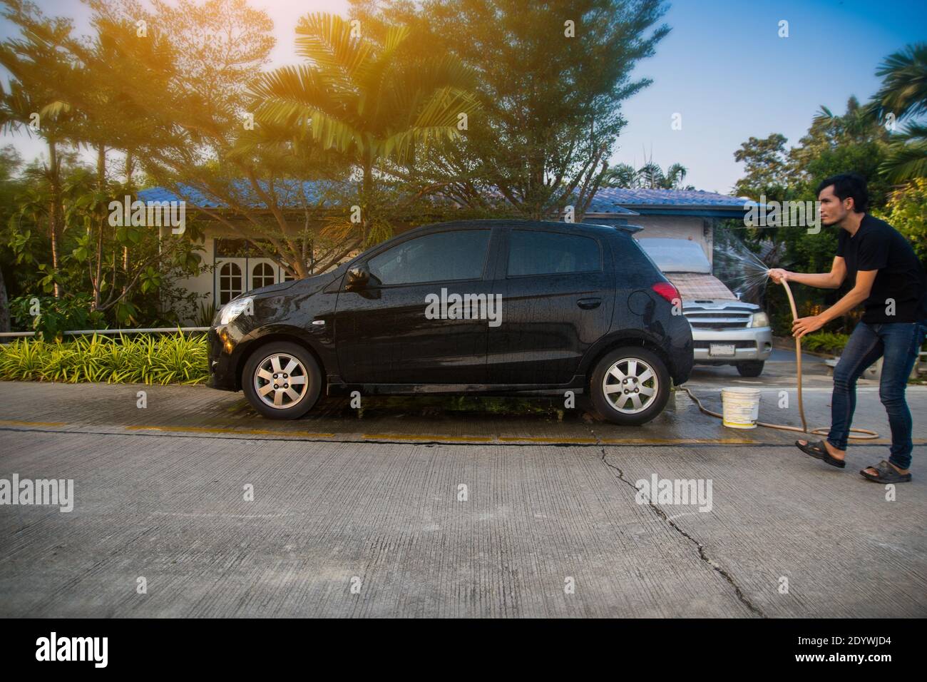 Man washing truck hires stock photography and images Alamy