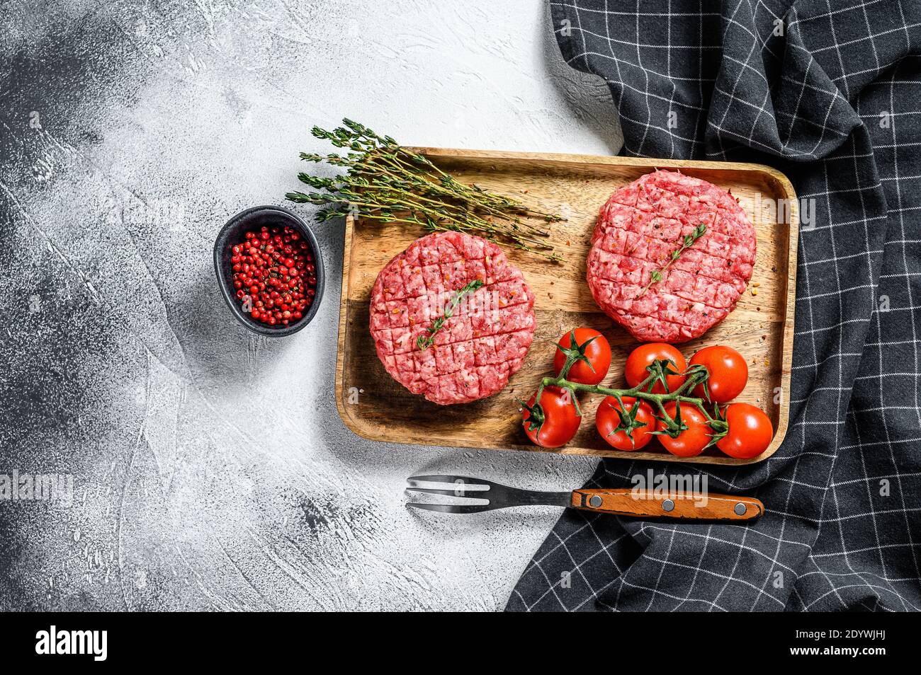 The ground beef patties, minced meat cutlets. Gray background. Top view Stock Photo Alamy