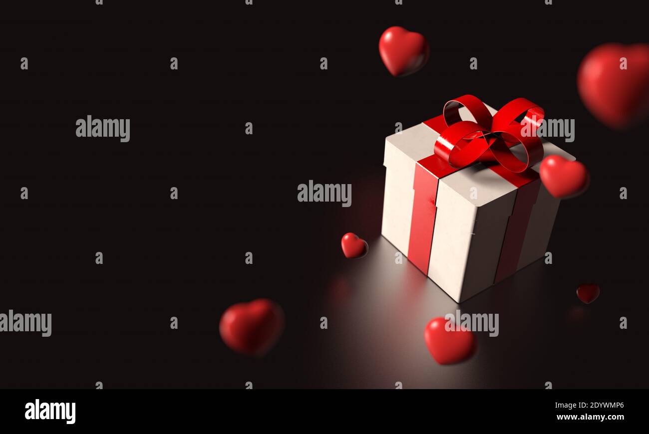 White gift box with red ribbon and many heart falling from sky on black ...