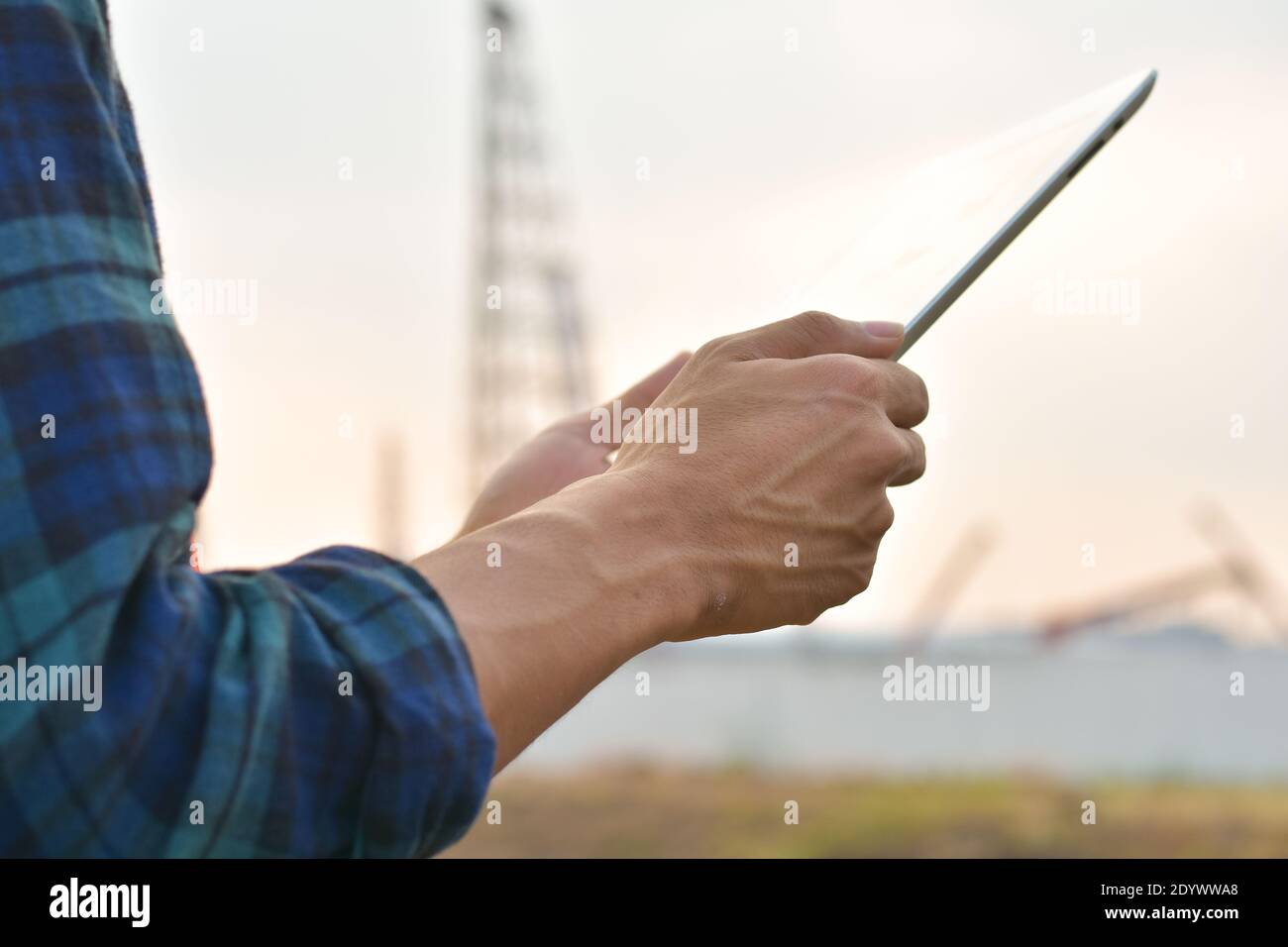 Close up Engineer Construction holding tablet checking work estate technology Stock Photo
