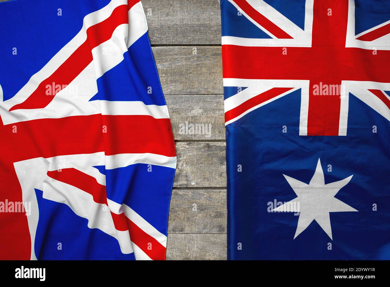 Union Jack flag and flag of Australia on grey wooden background Stock Photo  - Alamy