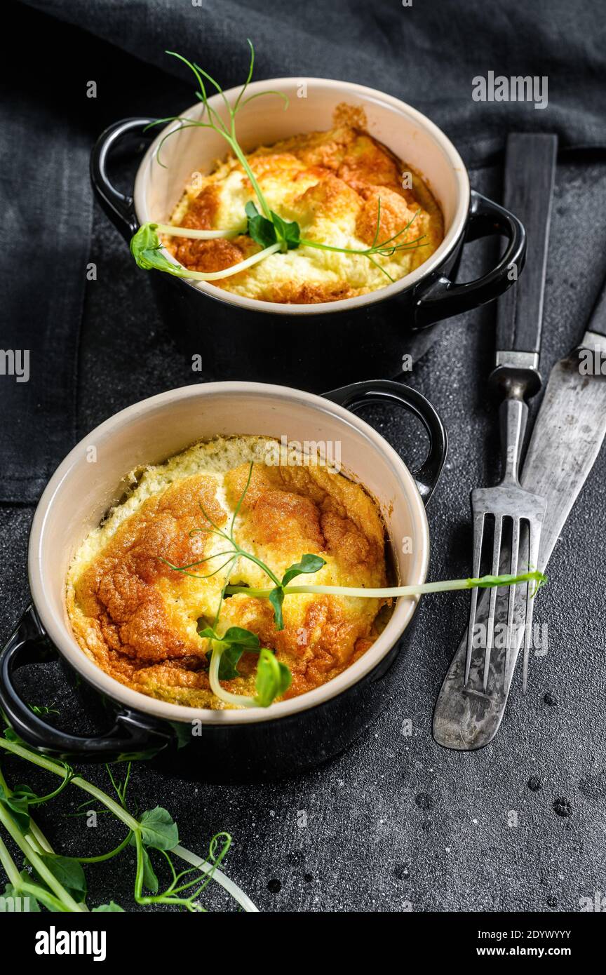 Spanish potato omelette tortilla served in pan. Black background. Top view Stock Photo Alamy