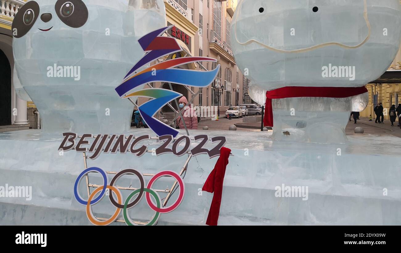 Two ice sculptures depicting the official mascots of 2022 Winter