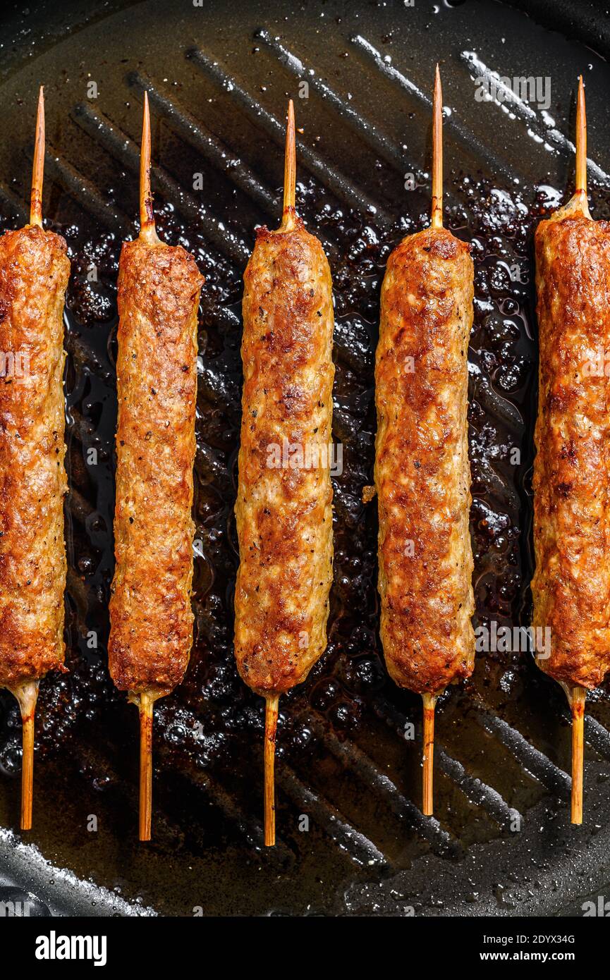 Turkish and Arabic Traditional kebab, ground beef, lamb meat. White