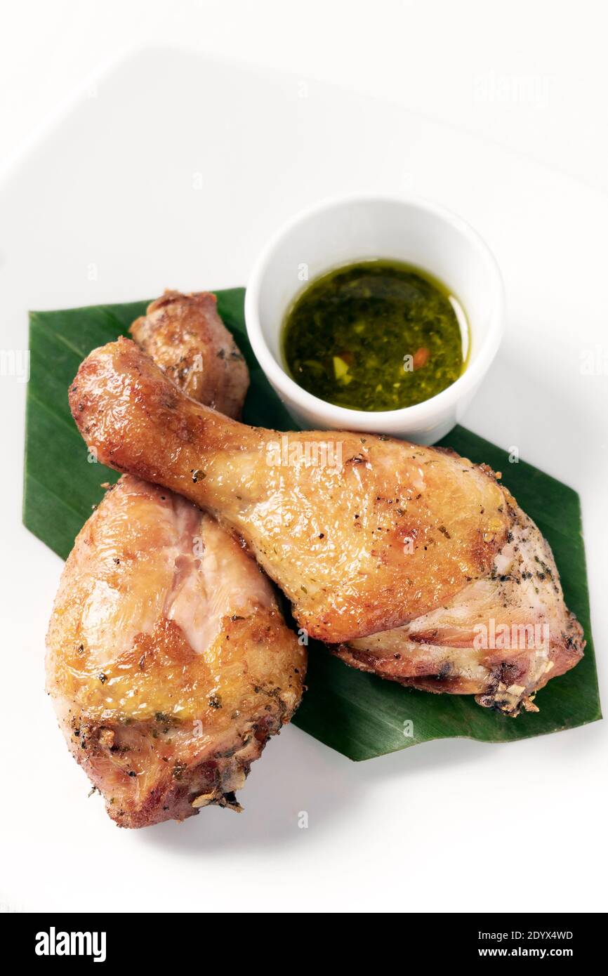 roast chicken drumsticks appetizer with spicy thai green chilli sauce