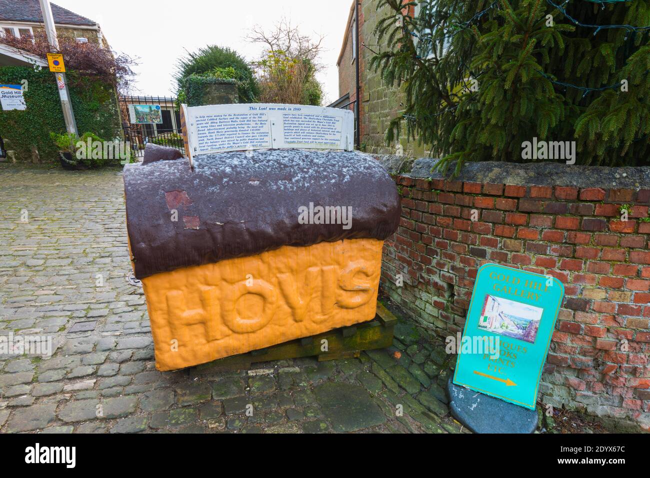 Shaftesbury, Dorset, UK.  28th December.  UK Weather.  A view of the Hovis bread loaf at the top of Gold Hill at Shaftesbury in Dorset on a cold icy morning with wintery showers shortly after sunrise.  Picture Credit: Graham Hunt/Alamy Live News Stock Photo