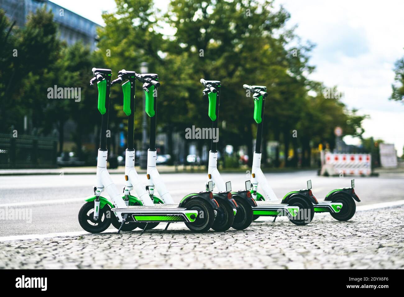 electric scooters for rent on street Stock Photo