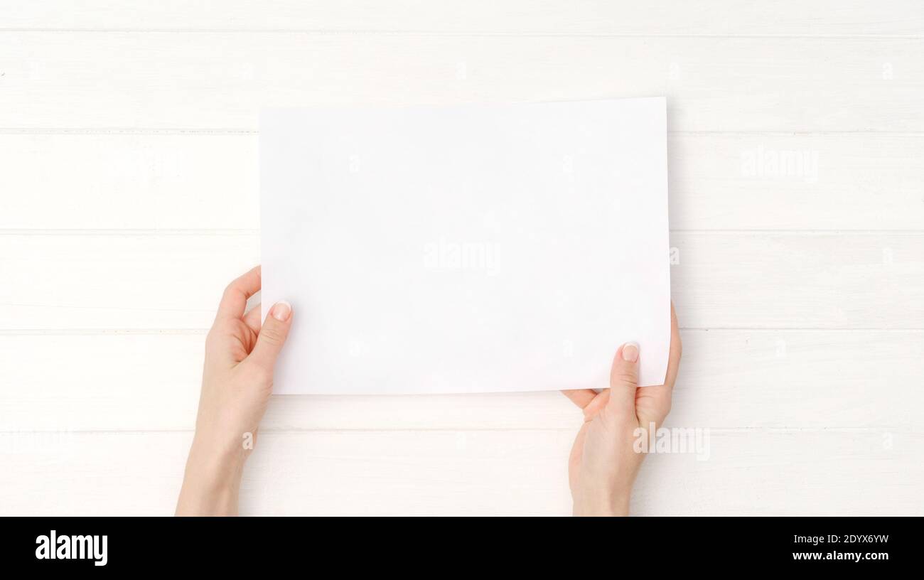 Person Holding A4 Paper High Resolution Stock Photography And Images Alamy