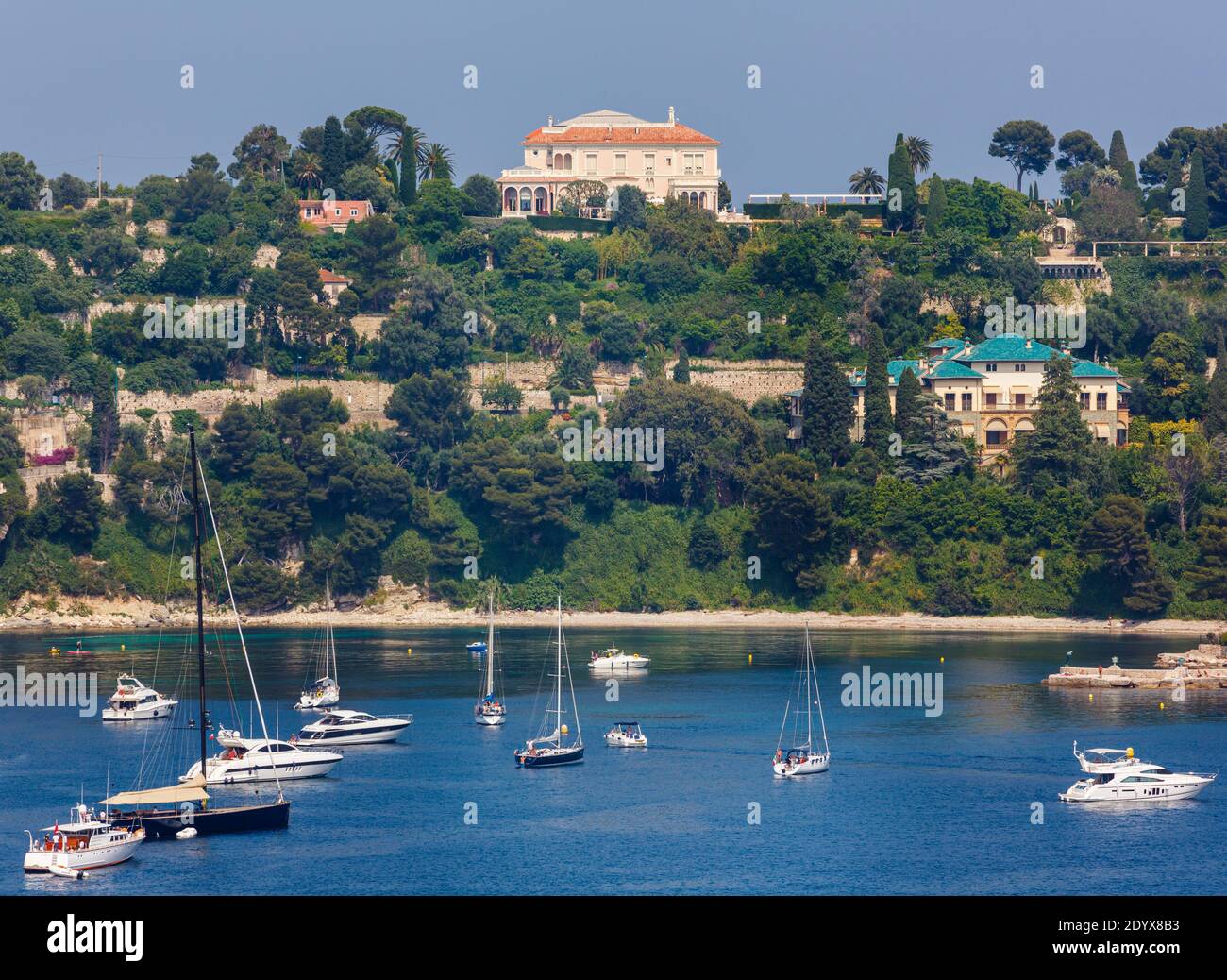 Saint-Jean-Cap-Ferrat, Cote d'Azur, French Riviera, Alpes-Maritimes, France.  View across bay to Villa Ephrussi de Rothschild. Stock Photo