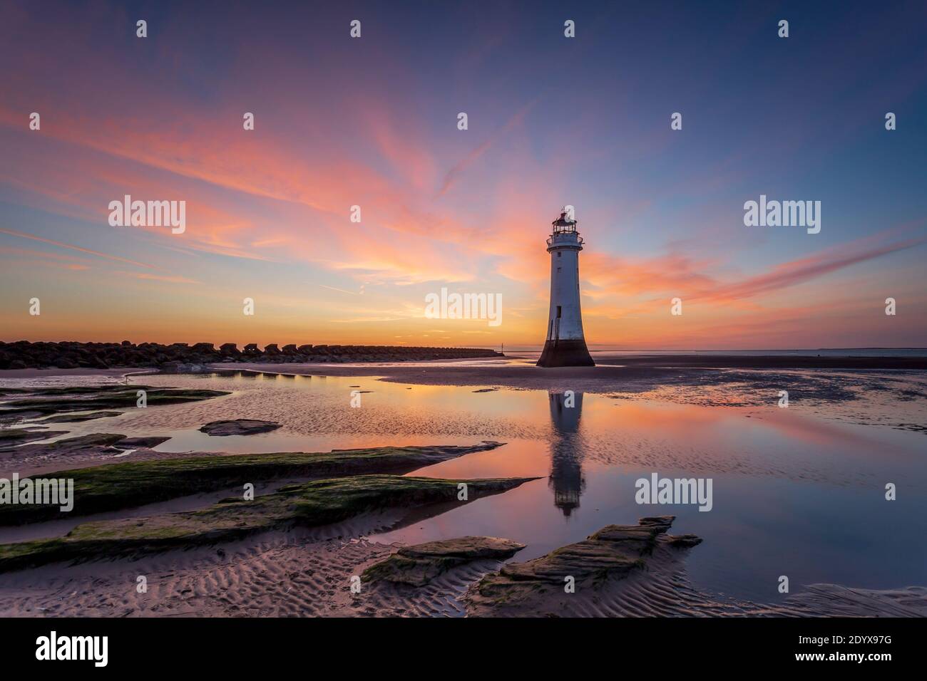 Perch Rock Lighthouse at sunset. Stock Photo