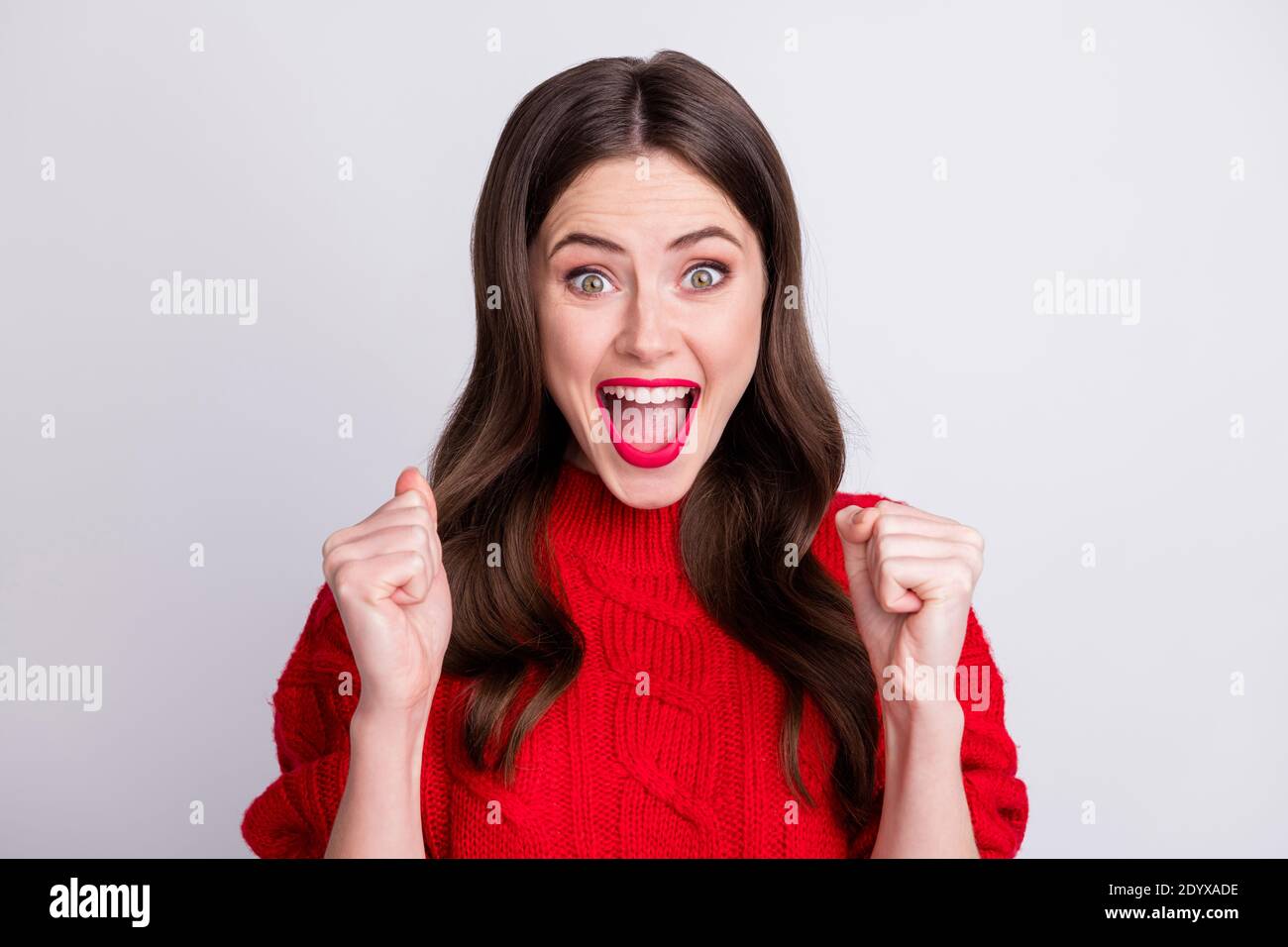 Photo portrait of cheerful brunette happy shouting gesturing like ...