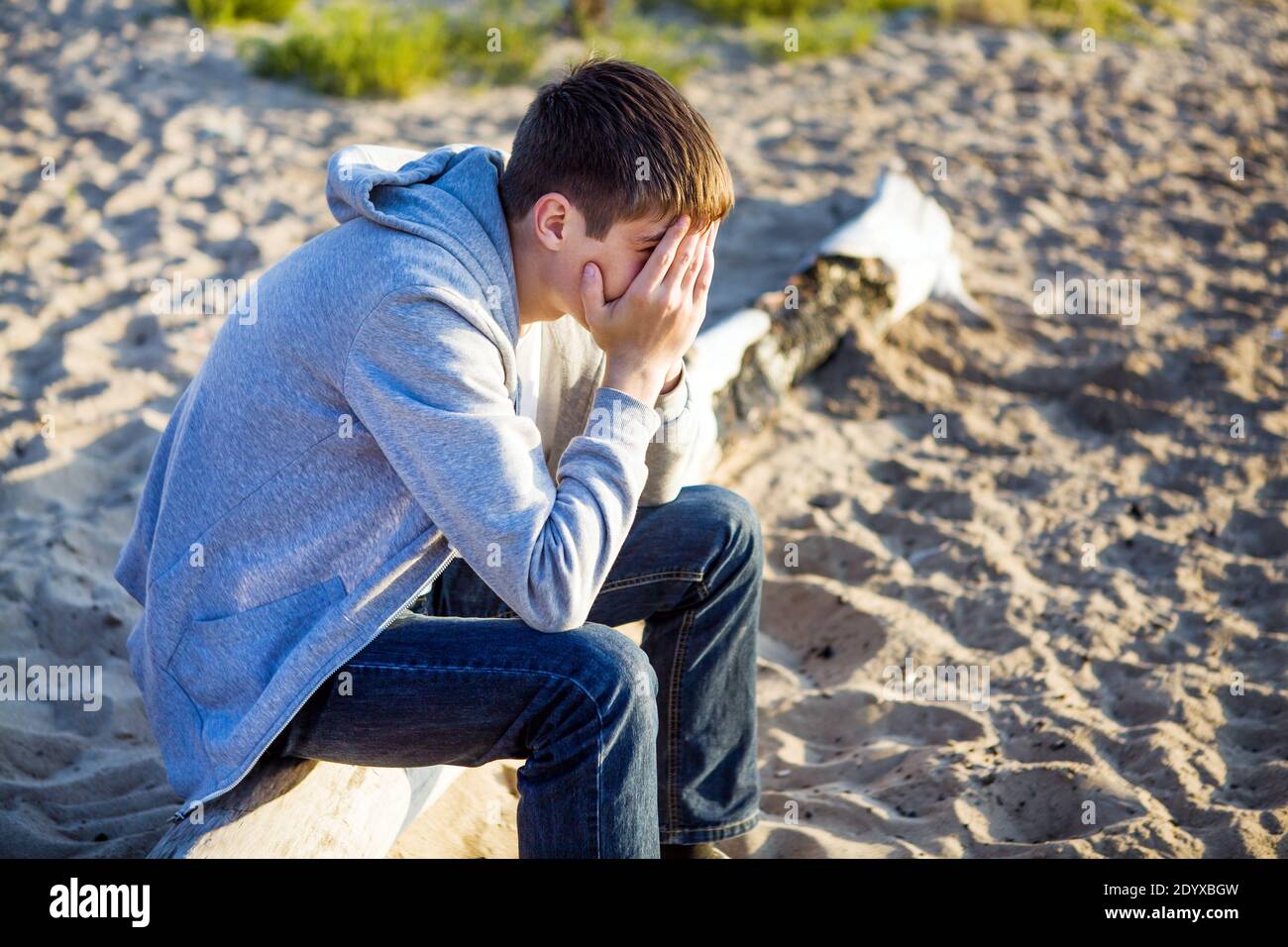Sad Young Man close the Face outdoor Stock Photo - Alamy