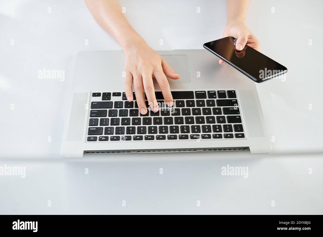 Woman working on laptop Stock Photo