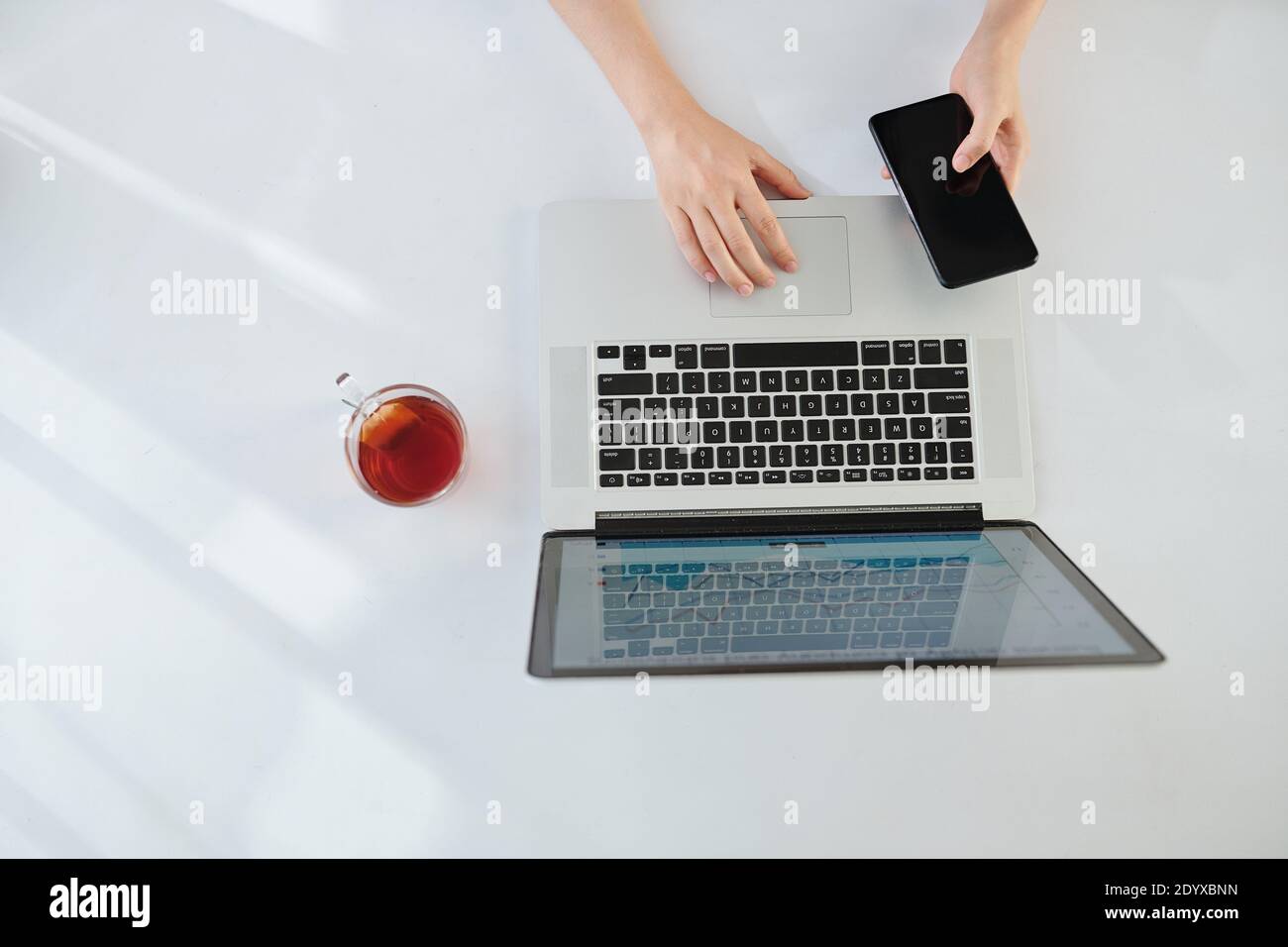 Woman working on laptop Stock Photo