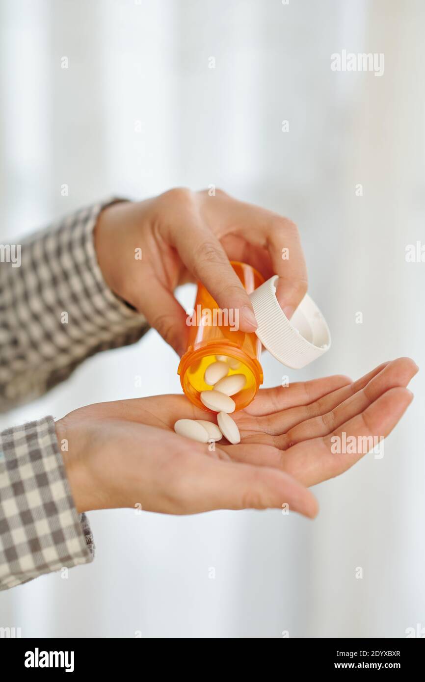 Patient taking tablets Stock Photo Alamy
