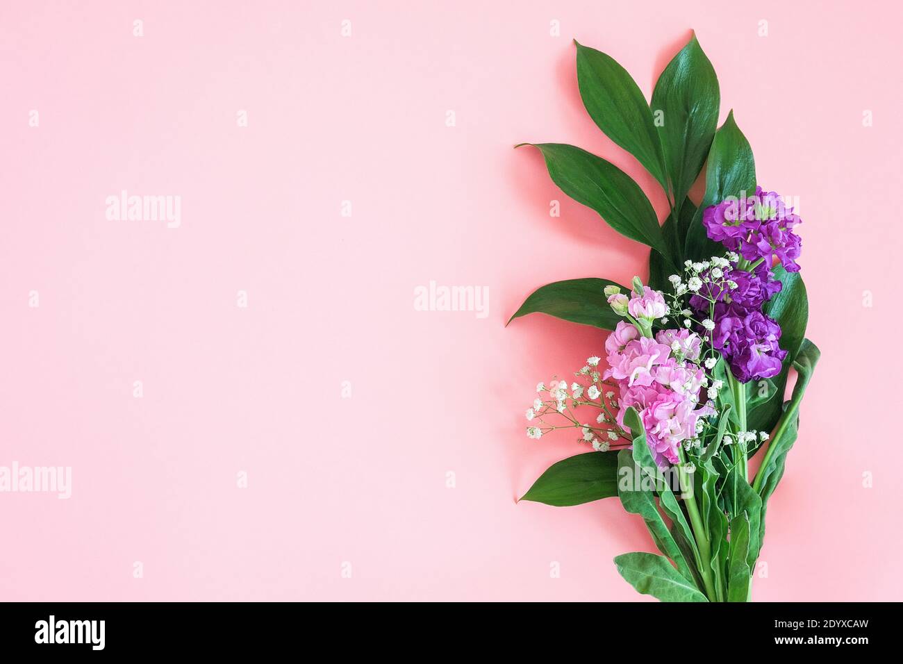 Bouquet flowers on pink background. Greeting card Flat Lay Copy space Concept Hello summer, Mother's day, Womens day, Good day Template for text and d Stock Photo