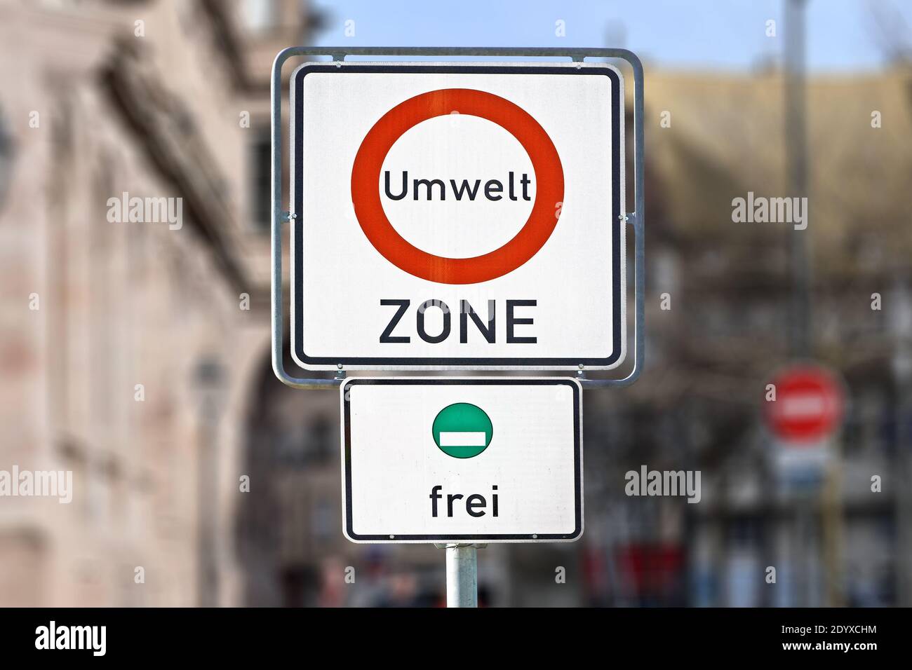 Road traffic sign marking a low emission zone in city centers in Germany translating as "Environmental Zone" Stock Photo