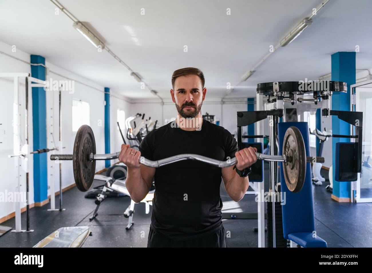 Bicep curl bar hi res stock photography and images Alamy
