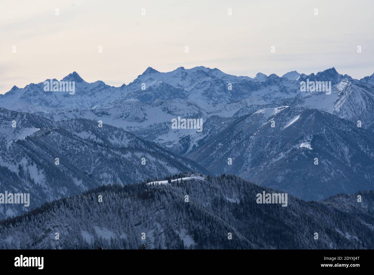View from the Seekarkreuz peak in the Mangfall mountain range near Lenggries, Bavaria, Germany towards the Karwendel mountain range in the background Stock Photo