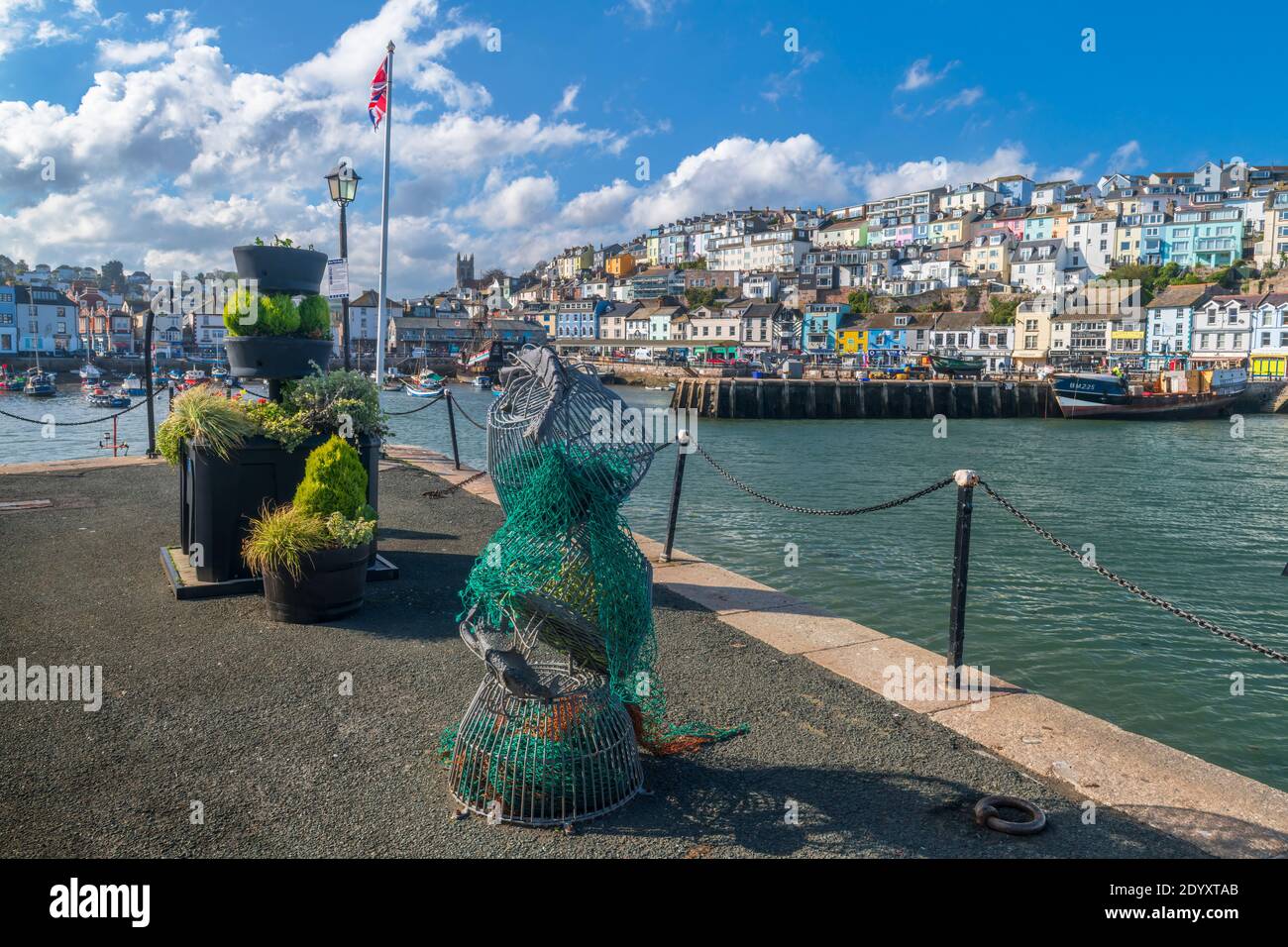 Wednesday 14th October 2020. Brixham, South Devon, England. On a beautiful sunny, but breezy afternoon in South Devon, holidaymakers enjoy themselves Stock Photo