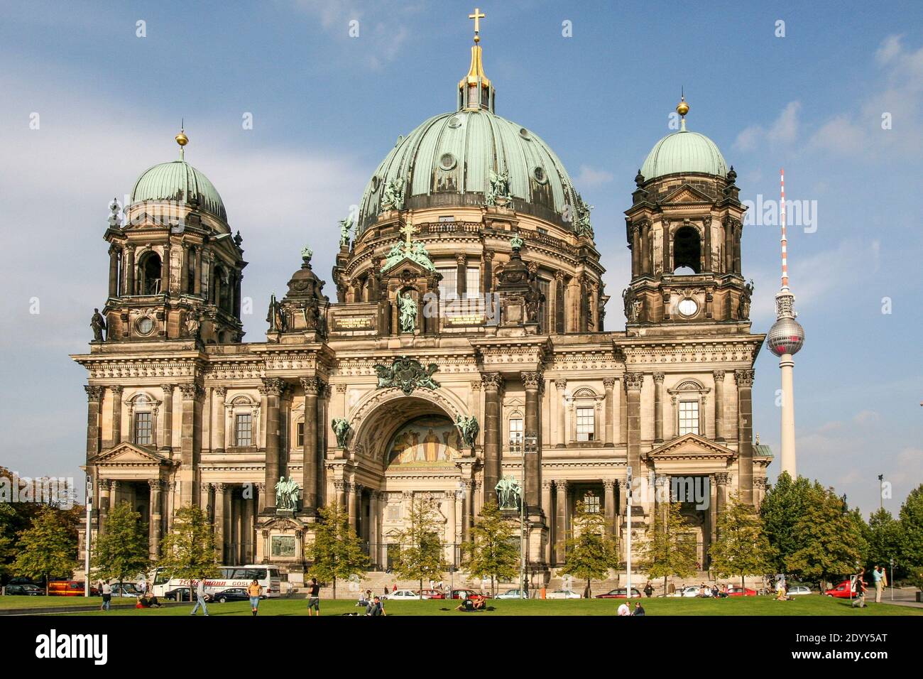 Sunny weather Berlin. The Berliner Dom Berlin Cathedral, with Fernsehturm  (the Berlin TV tower) in the background on a bright sunny day with blue sky  Stock Photo - Alamy