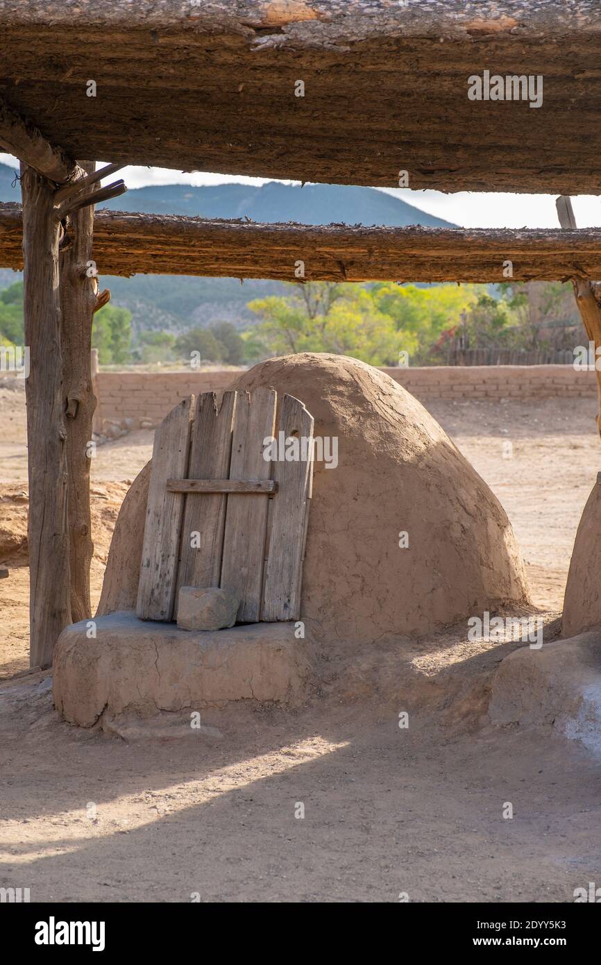 An outdoor adobe oven in the historical Native American village of Taos