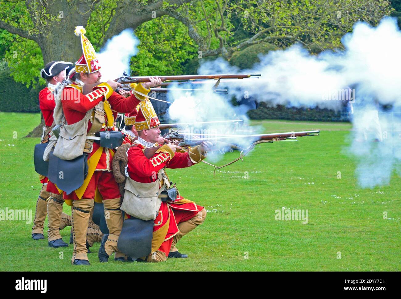 The Redcoats of  Pulteneys  Regiment firing their Muskets. Stock Photo