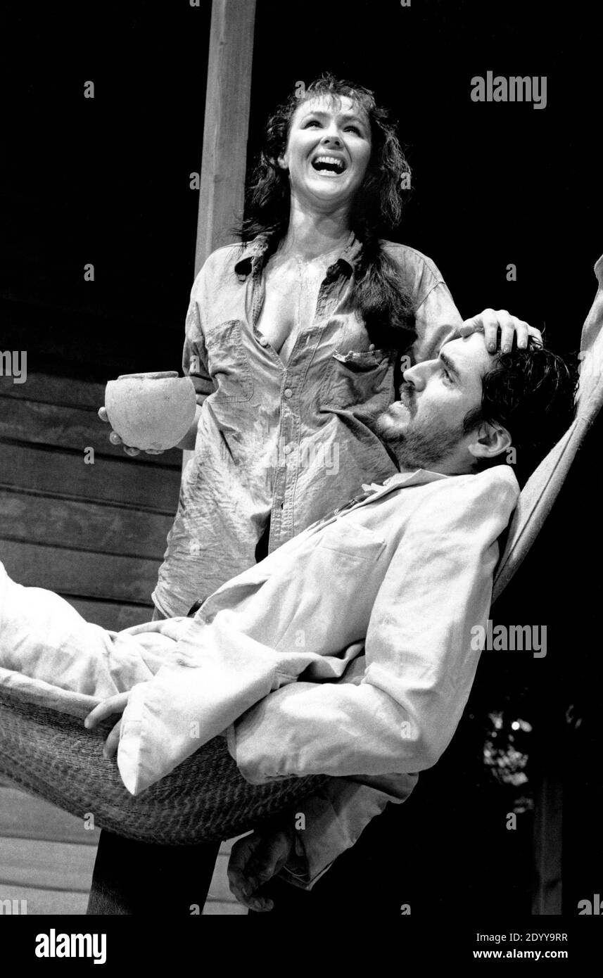 Frances Barber (Maxine Faulk), Alfred Molina (The Reverend Shannon) in THE NIGHT OF THE IGUANA by Tennessee Williams at the Lyttelton Theatre, National Theatre (NT), London SE1  06/02/1992  design: Bob Crowley lighting: Jean Kalman director: Richard Eyre Stock Photo